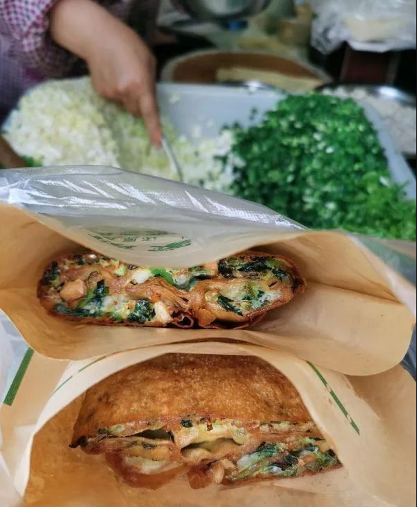 宿迁老夫妻腾煎饼25年买了两套房抚养儿女上大学